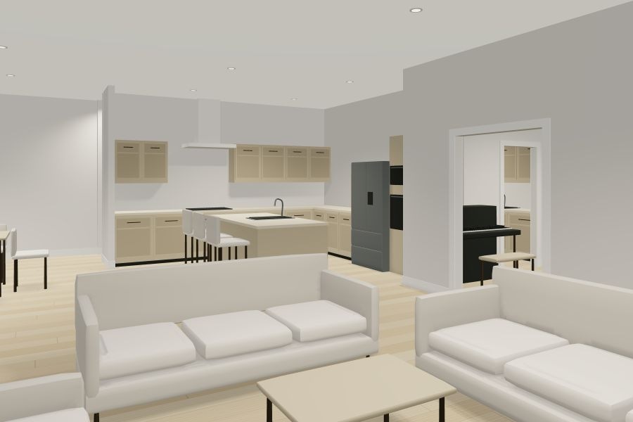 Updated living room looking toward the kitchen, dining room and music room.